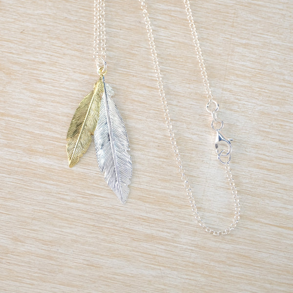 Silver and Gold Feather Pendant Necklace by JB Designs.