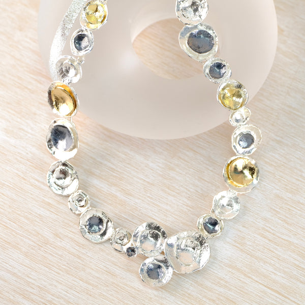 Satin Silver, Oxidized Silver and Gold Plated Linked Necklace by JB Designs.