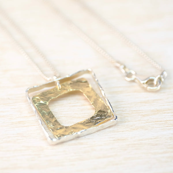 Silver and Gold Plated Squares Pendant Necklace by JB Designs.