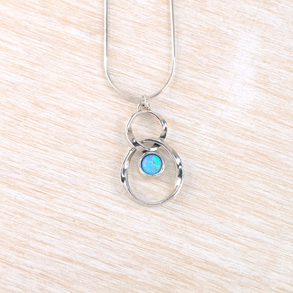 Sterling Silver and Opal Twist Pendant.