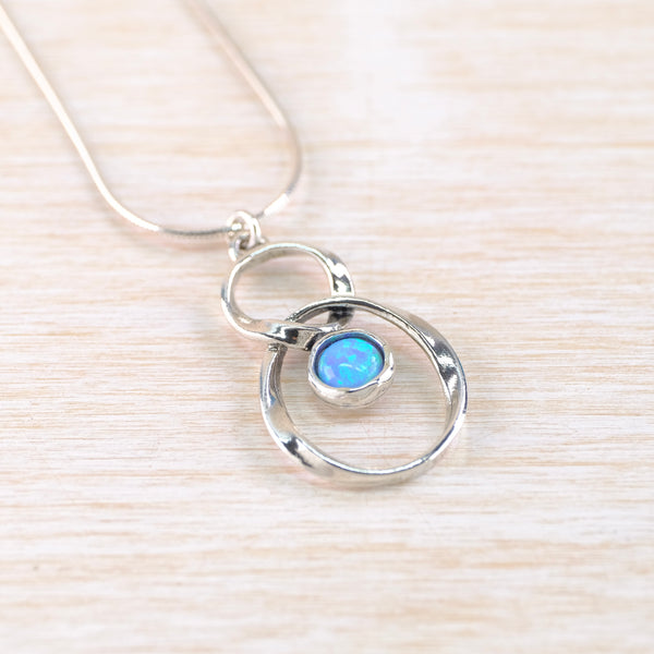 Sterling Silver and Opal Twist Pendant.