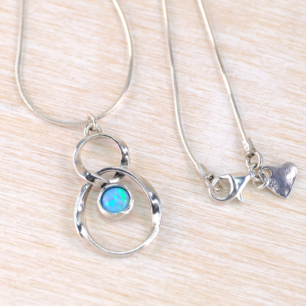 Sterling Silver and Opal Twist Pendant.