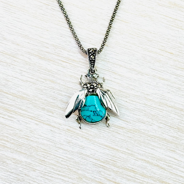 Turquoise and Silver Bee Design Pendant.