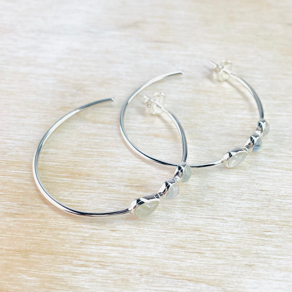 Round Hoop Silver and Rainbow Moonstone Earrings.