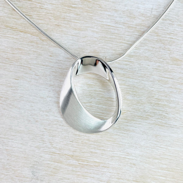 Brushed and Polished Silver Mobius  Pendant by JB Designs.