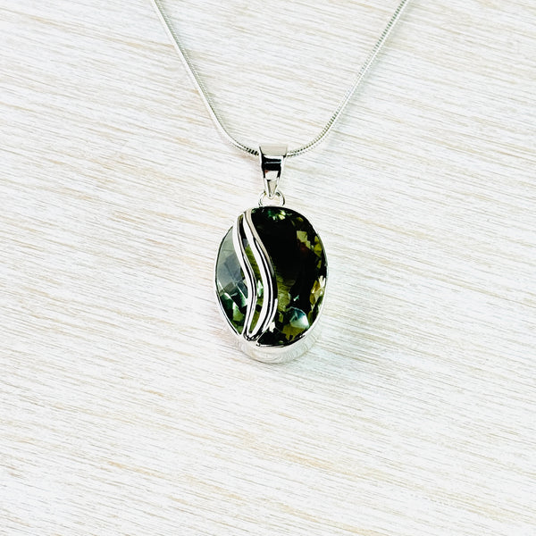 Oval Green Amethyst Pendant with Sterling Silver Overlay.