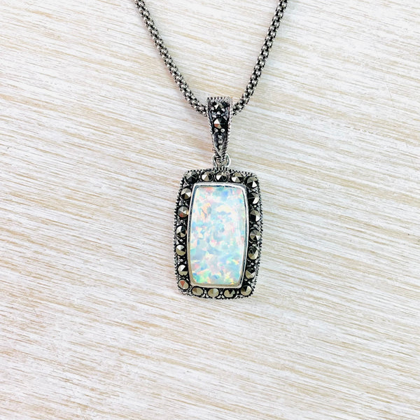 Silver, Marcasite and Opal Pendant.