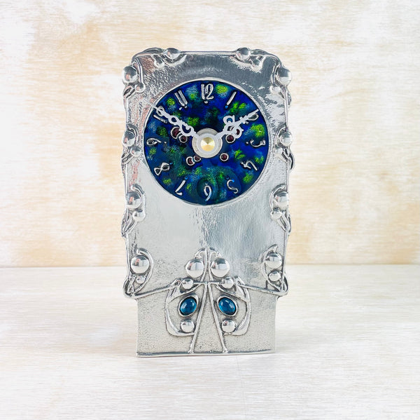 Pewter and Enamel Mantel clock, Archibald Knox Design.