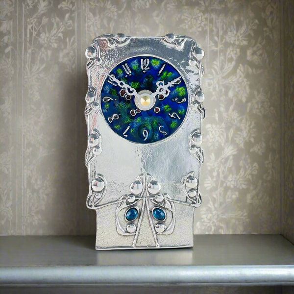 Pewter and Enamel Mantel clock, Archibald Knox Design.