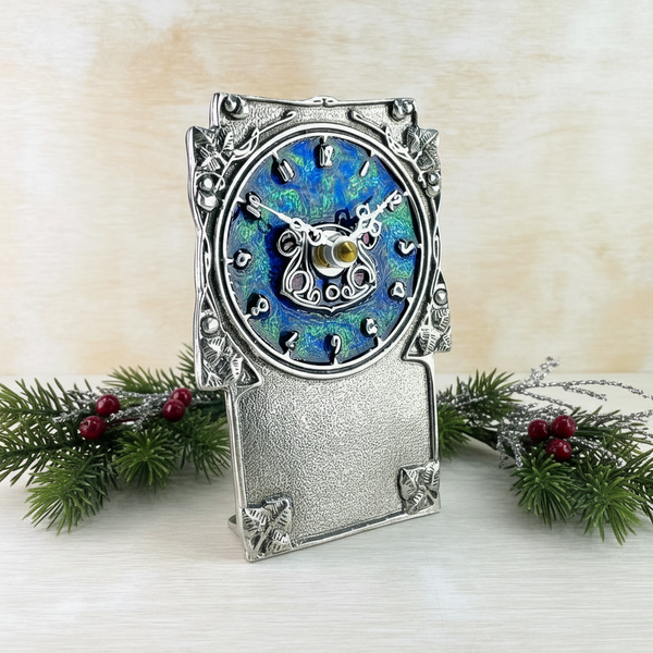 Pewter and Enamel Mantel clock, Archibald Knox Design.