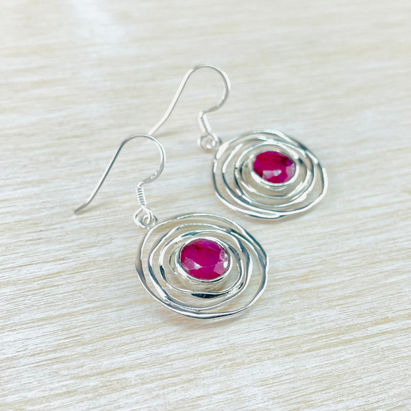 Sterling Silver and Ruby Quartz Swirl Drop Earrings.