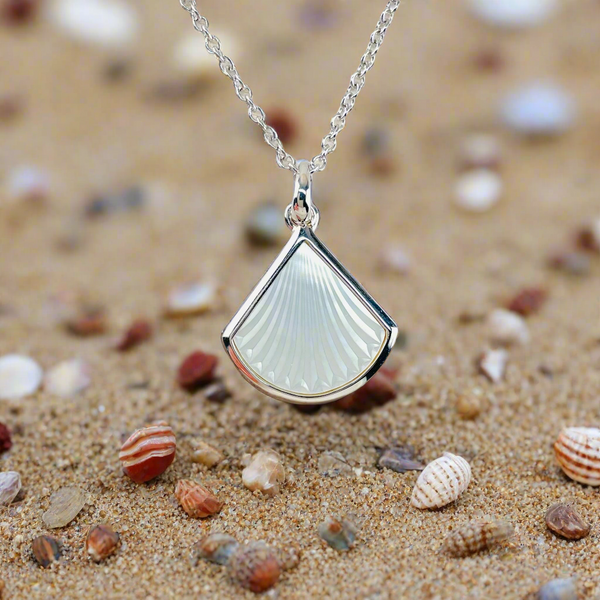 Sterling Silver and Carved Mother of Pearl Pendant.