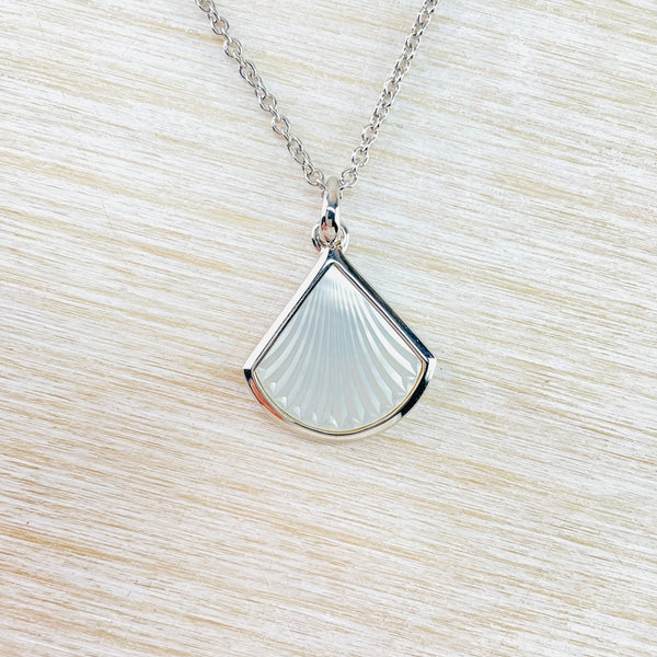 Sterling Silver and Carved Mother of Pearl Pendant.