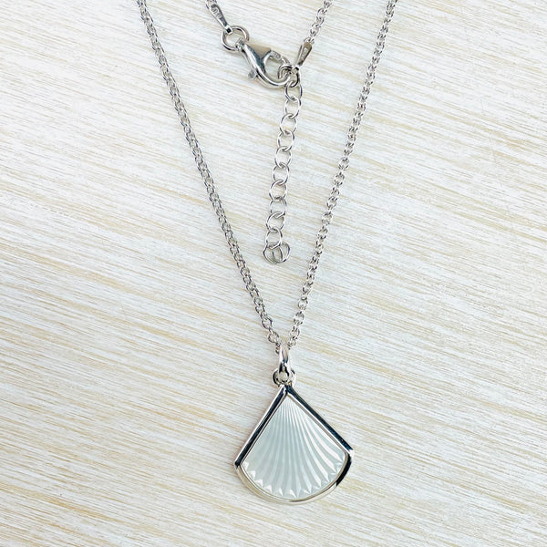 Sterling Silver and Carved Mother of Pearl Pendant.