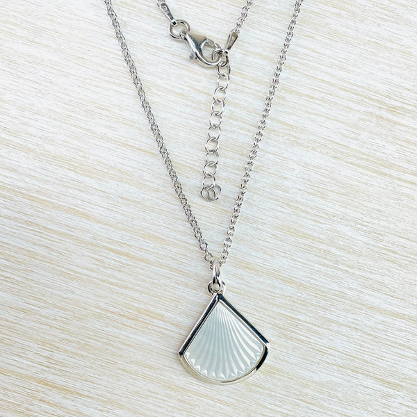 Silver and Carved Mother of Pearl Pendant.