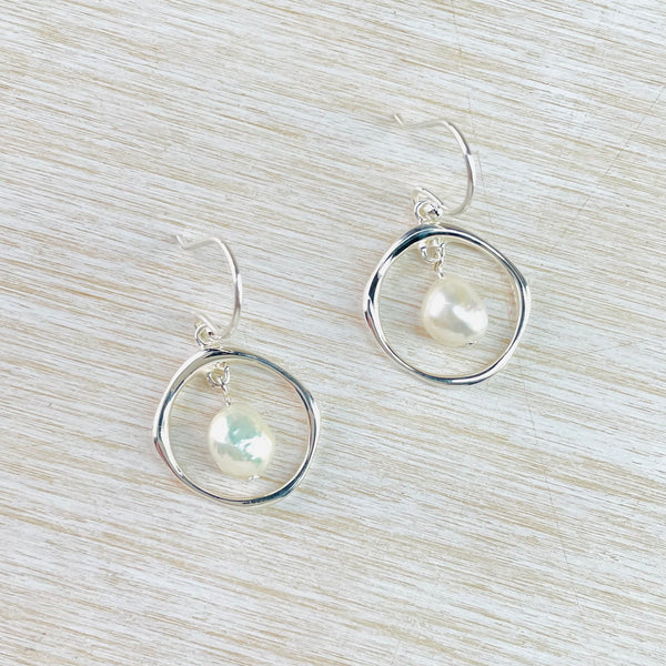 Pearl in a Sterling Silver Ring Drop Earrings.