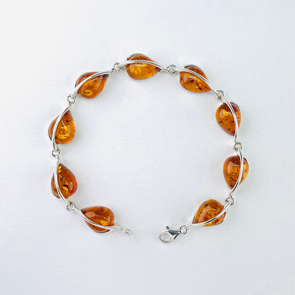 Silver and Tear Drop Cognac Amber Bracelet with Silver Overlay.
