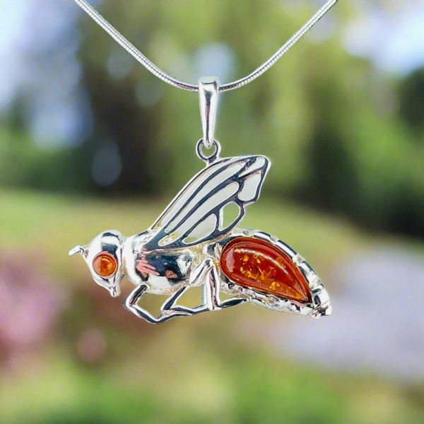 Sterling Silver and Amber Bug Design Pendant.