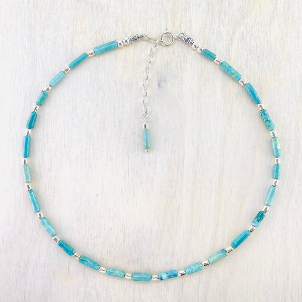 African Turquoise Tube Bead and Silver Necklace by Emily Merrix.