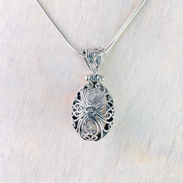Silver and Oval Mabe Pearl Pendant.