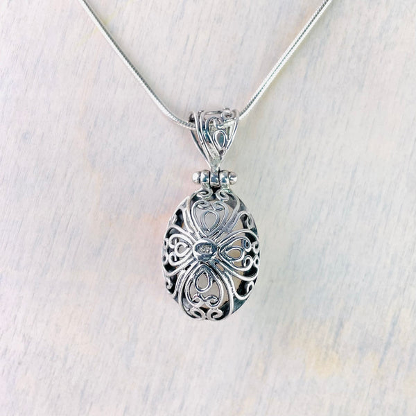 Silver and Oval Mabe Pearl Pendant.