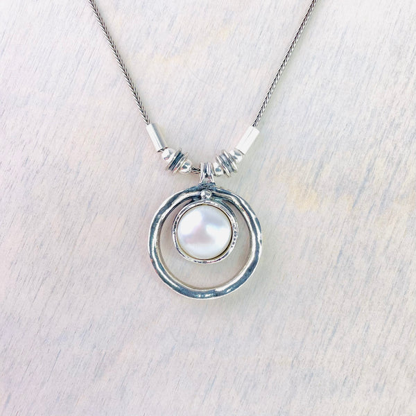 Sterling Silver and Pearl Double Circle Pendant.