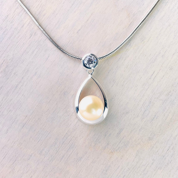 Silver, CZ and Pearl Tear Drop Pendant.
