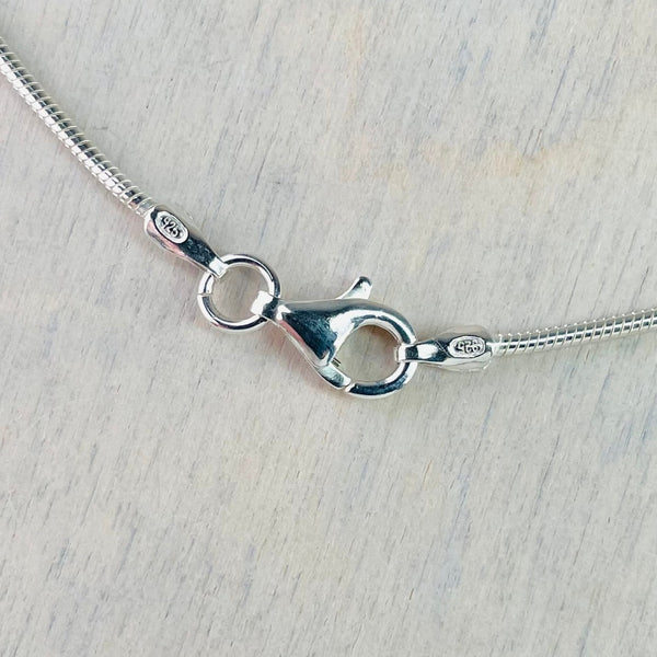Simple Sterling Silver and Tear Drop Black Onyx Pendant.