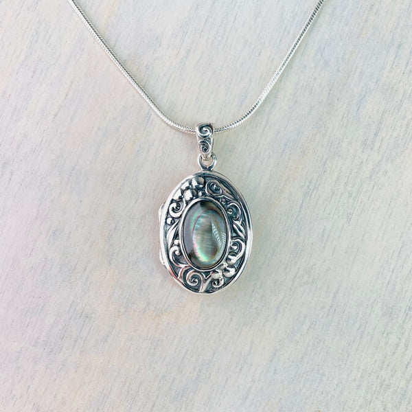 Silver and Abalone Shell Locket.