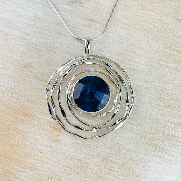 Silver Swirl and Sapphire Quartz Pendant.