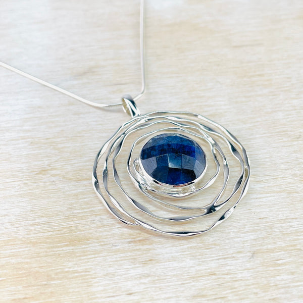 Silver Swirl and Sapphire Quartz Pendant.