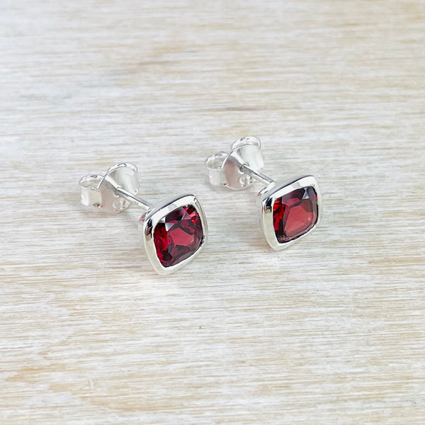 Silver and Garnet Square Stud Earrings.