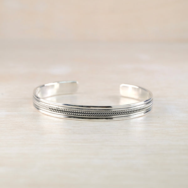 Sterling Silver Slim Torque Bangle Bracelet with Decorative Detail.