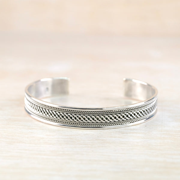 Sterling Silver Torque Bangle Bracelet with Decorative Detail.