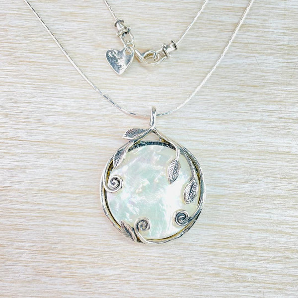 Decorative Sterling Silver and Mother of Pearl Pendant.