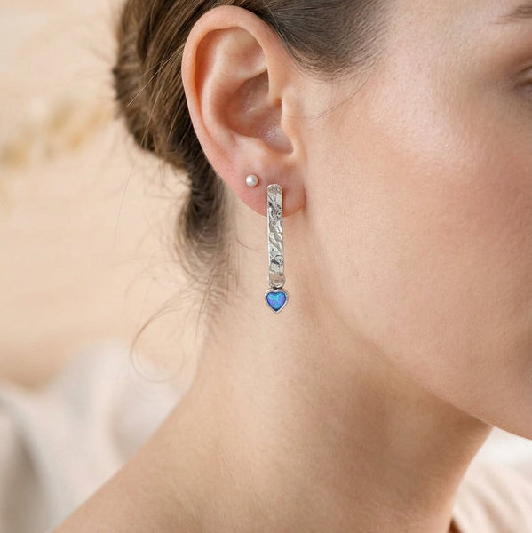 Sterling Silver Scrolled Stem and Dangly Opal Heart Earrings.