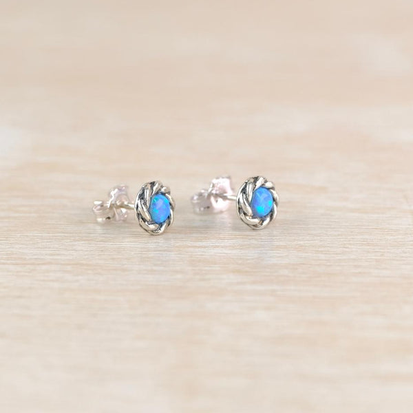 Round Sterling Silver and Opal Stud Earrings.