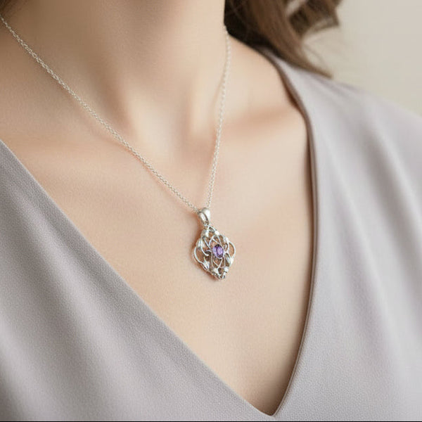 Vintage Silver Entwined Leaves Pendant with Amethysts.