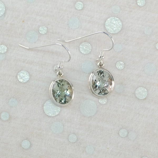 Sterling Silver and Oval Faceted Green Amethyst Drop Earrings.