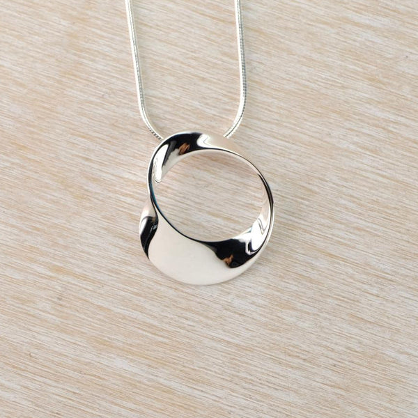 Sterling Silver Round Mobius Pendant by JB Designs.