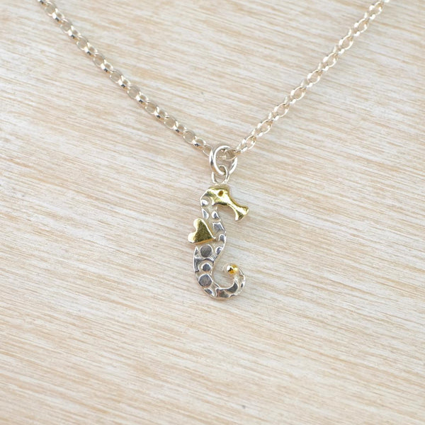 Silver Seahorse Pendant with Gold-Plated Details.