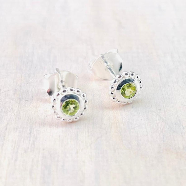 Small Round Silver and Peridot Stud Earrings.