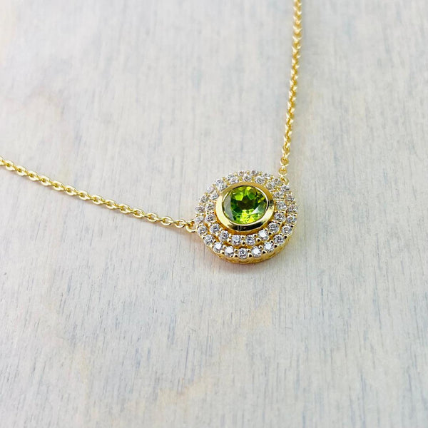 Peridot and Gold Plated Silver Necklace with CZ Surround.