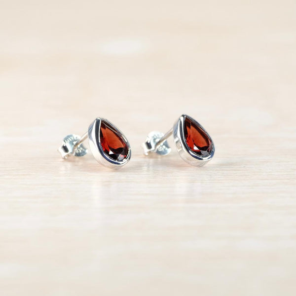 Tear Drop Sterling Silver and Garnet Stud Earrings.