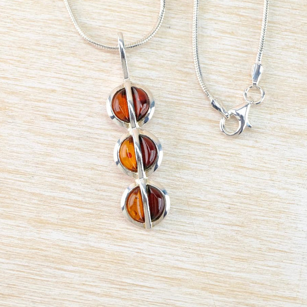 Three Circles of Baltic Amber and Sterling Silver Pendant Necklace.