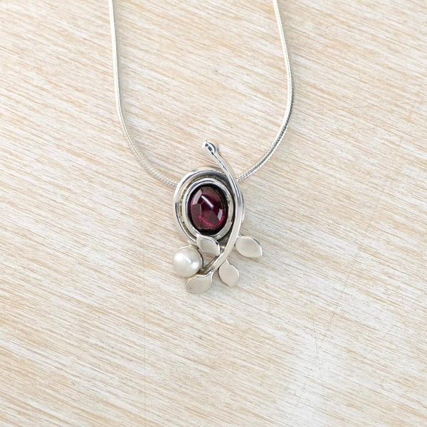 Silver, Cabochon Garnet and Pearl Pendant Necklace.