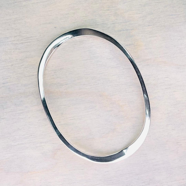 Curved Oval Sterling Silver Bangle.