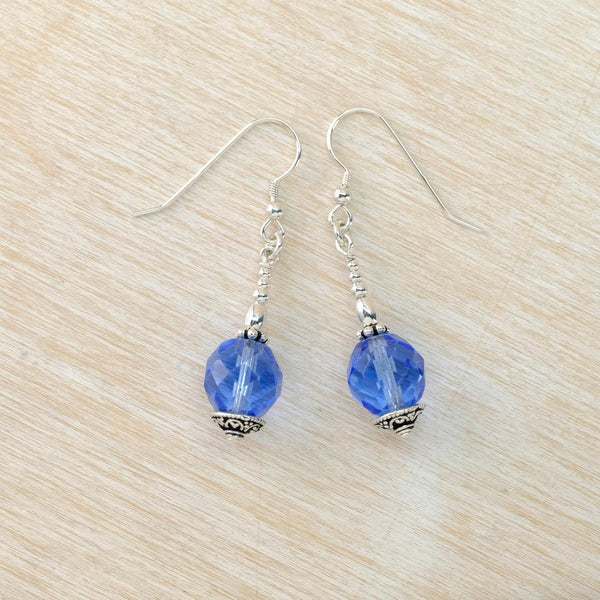 drop earrings with faceted blue glass beads and silver fittings