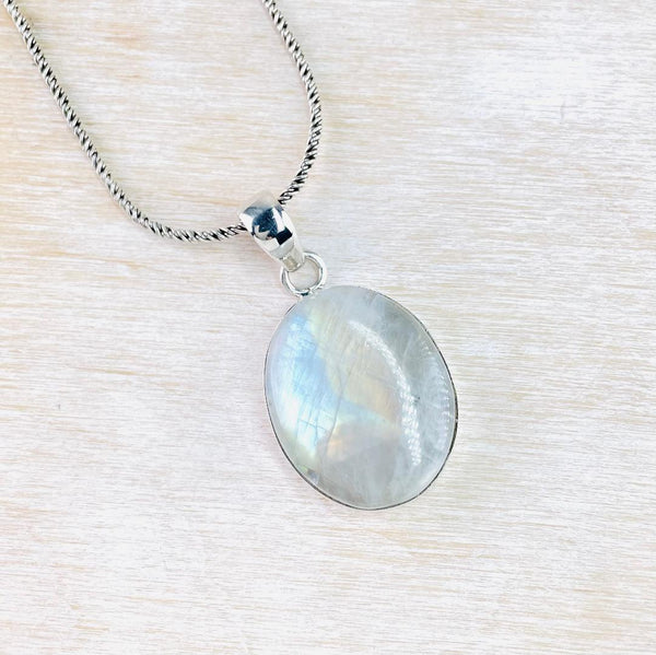 Larger Sterling Silver and Oval Rainbow Moonstone Pendant.