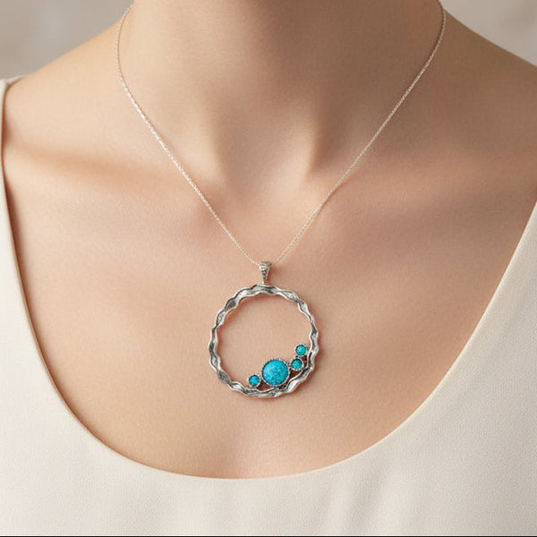 Sterling Silver Open Circle Pendant with Opals.